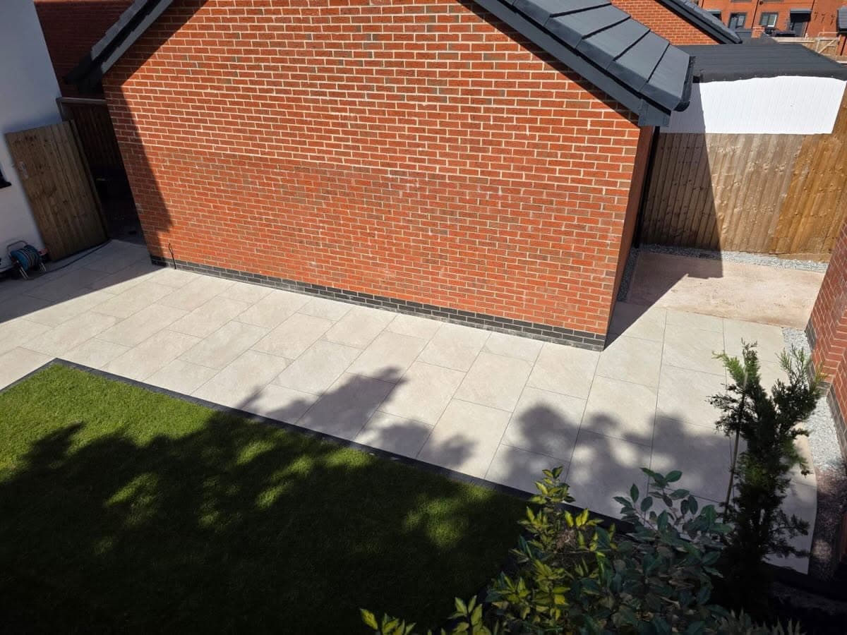 Neatly laid garden paving and lawn