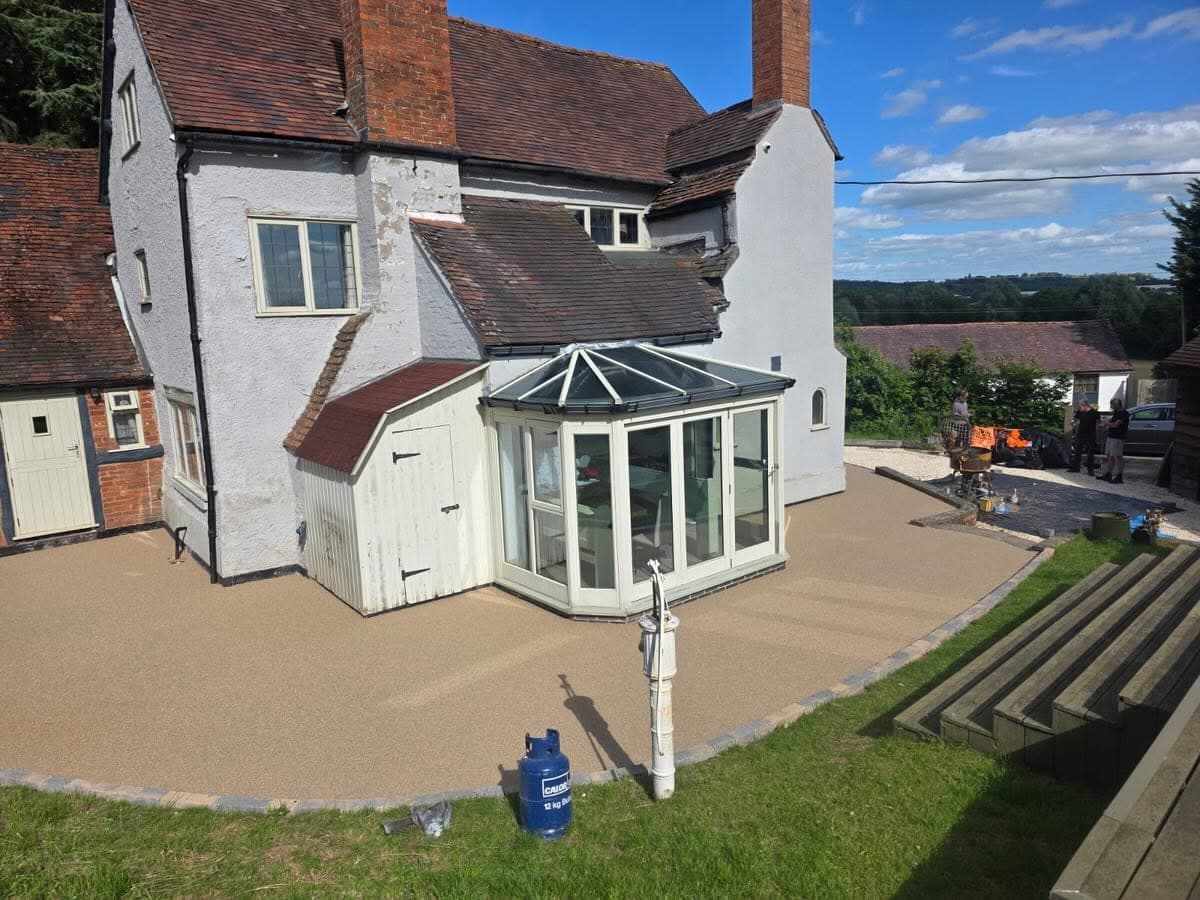 Resin-bound surface surrounding a country home